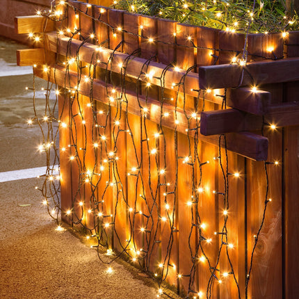 Solar Lichterkette 20M mit 200 LEDs, 8 Programmen, Schwarzes Kabel, Warm Licht, für Außen