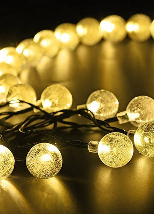 Solar Lichterkette 7M mit 50 Kugeln-LEDs, Dunkelgrün Kabel, Warm Licht, für Außen