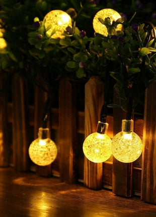 Solar Lichterkette 7M mit 50 Kugeln-LEDs, Dunkelgrün Kabel, Warm Licht, für Außen